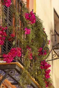 Closeup isolated view of a false balcony with narrow ceramic tile deck and me Stock Photos