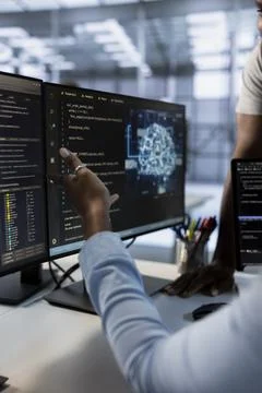 Closeup of IT experts using PC to implement server virtualization in data center Stock Photos