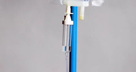 Closeup of IV drip on site of an emergency, Intravenous saline solution, IV Stock Footage 237364689
