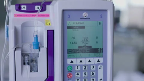 Closeup of an IV pump in a hospital Stock Footage