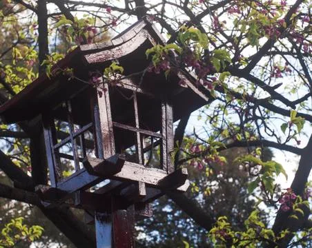 Closeup of japanese traditional lantern in garden Stock Photos