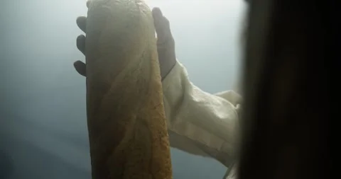 Closeup of Jesus Holding Passover Bread, Last Supper, Communion, Christianity Stock Footage 306592738