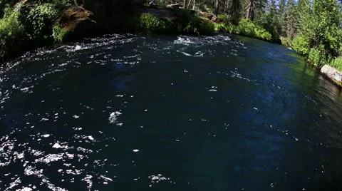 CLOSEUP KAYAKER RIDES DOWN SCENIC RIVER FISH-EYE SHOT Stock Footage 51764201