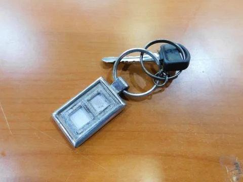 Closeup of a key attached with a ring and a metal Foto stock