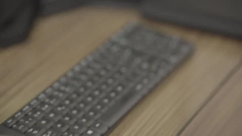 Closeup of a keyboard on a desk Stock Footage 280090153