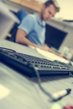 Closeup on keyboard in office. Stock Photos