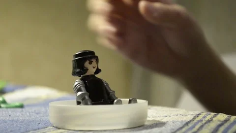 Closeup of a kid assembling a plastic toy Stock Footage 102399154