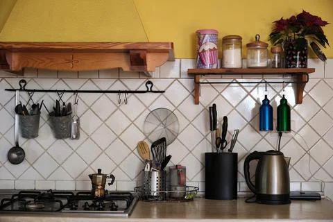 Closeup of a kitchen work top full of accessories Stock Photos
