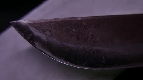 Closeup of a knife and a sharpener. 4K UHD Stock Footage 72919966