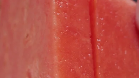 Closeup of a Knife Cutting Through a Watermelon Stock Footage 79044699