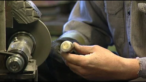 Closeup of Knife Maker Grinding Knife Stock Footage 93518963