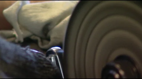 Closeup of Knife Maker Grinding Knife Stock Footage 93650679