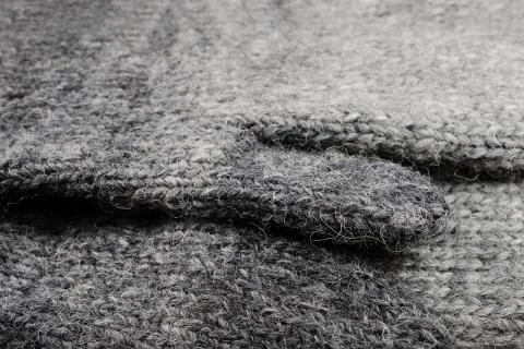 Closeup of knitted gray wool texture Stock Photos