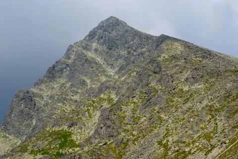 Closeup krivan mount top in a dense clouds Stock Photos