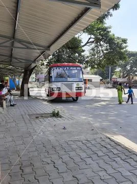 Closeup of KSRTC Bus Stand and Building with Buses pickup and drop of ...