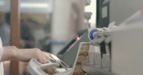 Closeup of a lab assistant's hands install a skin sample in the measuring device Stock-Footage 79092655