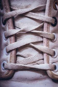 Closeup lacing background texture for design. Top view image of white sneaker Stock Photos