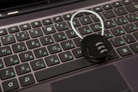 Closeup of laptop with cipher padlock. Information security concept. Foto stock