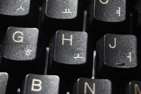 Closeup of laptop computer keyboard black keys with white letters and numbers Stock Photos