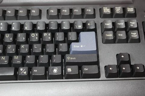 Closeup of laptop computer keyboard black keys with white letters and numbers 스톡 사진