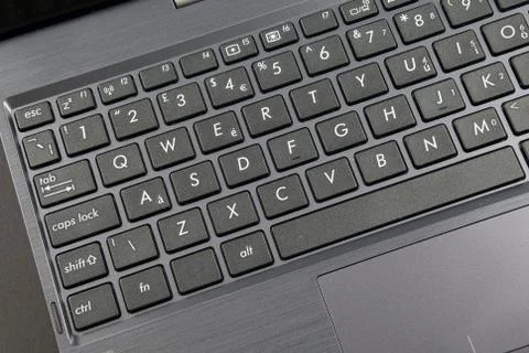 Closeup of a laptop keyboard left side Stock Photos