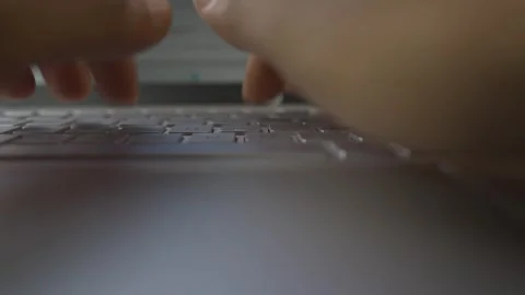 Closeup laptop keyboard type by two hand on white table Stock Footage 293514906