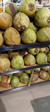Closeup of large coconut fruit Stock Photos