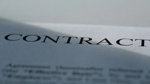 Closeup legal paperwork lying table surface. Official agreement form document Stock Footage 332416682