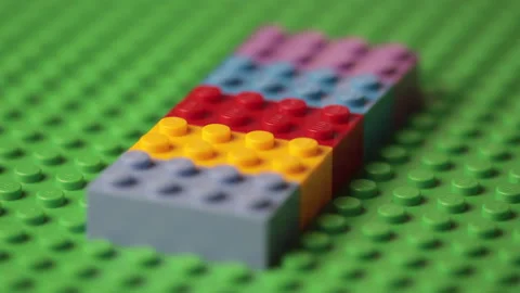Closeup of Lego bricks, shallow depth of field. Colorful toys concept Stock Footage 167354138