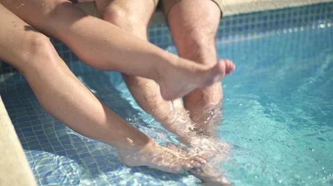 Closeup legs in pool Stock Footage 62697897