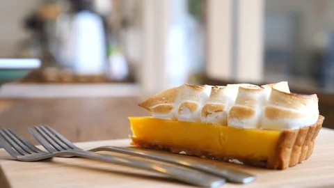 Closeup Of Lemon Cheese Cake With Coffee Cup Stock Footage 101248701
