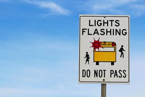Closeup of a Light Flashing Do Not Pass Sign Stock Photos