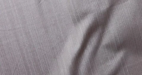Closeup of light gray polyester fabric with subtle striped pattern Stock Footage 274474709