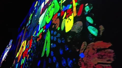 Closeup light show beamed to wall Atelier des Lumières Museum Cezanne Stock Footage 211323177
