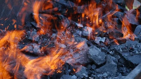 Closeup of lighting charcoal in a grill Video stock 251804805