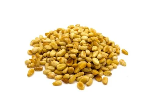 Closeup of Lightly Toasted Pine Nuts, Isolated Stock Photos
