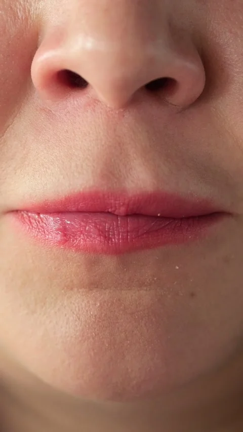 Closeup Lips Biting Crispy Nugget, Textured Crumbs And Golden Coating Visible Stock Footage 335503331
