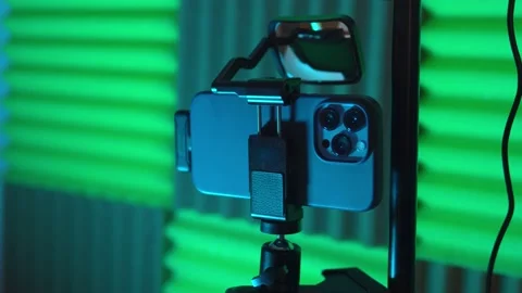 Closeup of live vlog setup with smarthone an dmicrophone on stand in vlogging Stock Footage 237092229