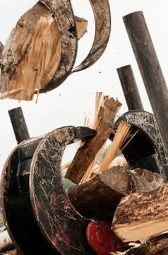 Closeup of log being split by timber jaws and log jaw wood splitter Stock Photos