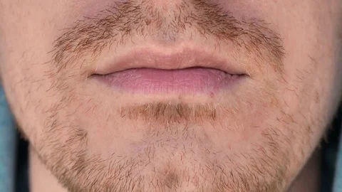 Closeup lower face of a guy Stock Footage 81913302