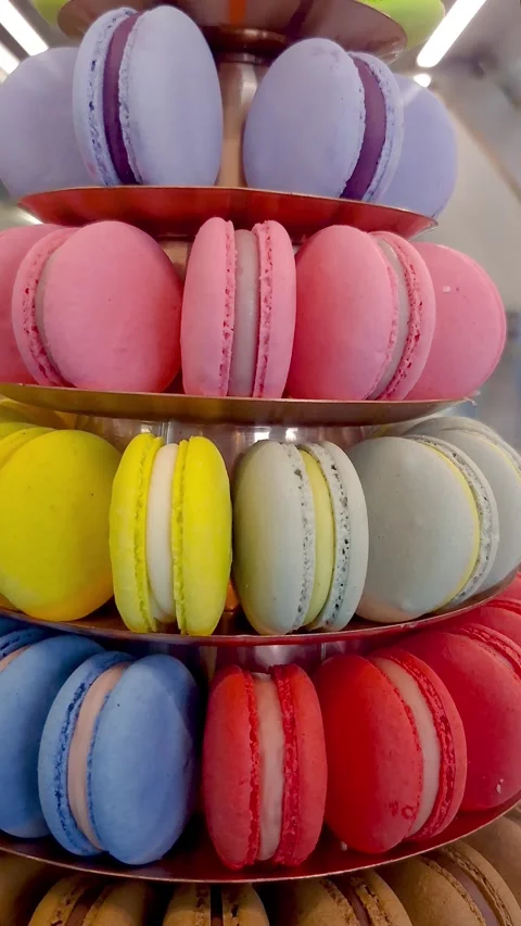 Closeup of a macaron tower through the display case of a Brazilian bakery v.. Stock Footage 328722040