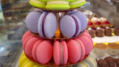 Closeup of a macaron tower through the display case of a Brazilian bakery. Stock Footage 328722041