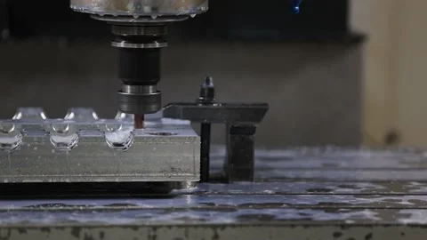 Closeup of machine fluid on CNC processing machining center in the factory place Stock Footage 239452629
