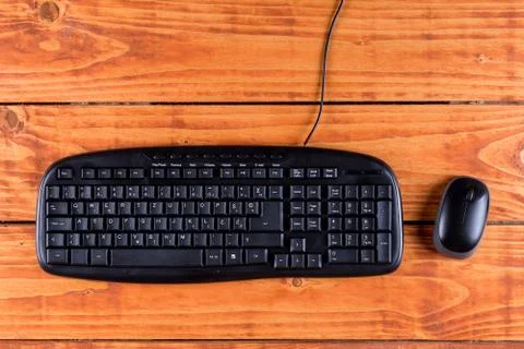Closeup macro black pc keyboard with black wireless mouse Stock Photos
