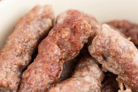 Closeup macro fresh minced meat cevapcici kebabs Stock Photos