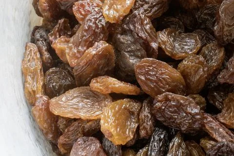 Closeup macro image of raisin. (top view) a raisin is a dried grape. stock .. Stock Photos