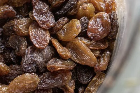 Closeup macro image of raisin. (top view) a raisin is a dried grape. stock .. Stock Photos