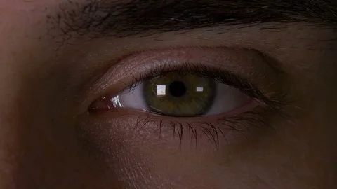 Closeup macro of man eye opening in slow motion Vídeos de archivo 75540315