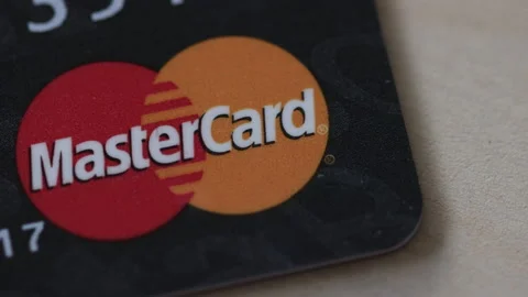 Closeup macro of a Master card. Consumerism, spending or debt concept Stock Footage 164778486