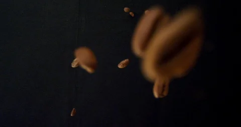Closeup macro shoot of coffee beans in detail being dropped with background Stock-Footage 111370686
